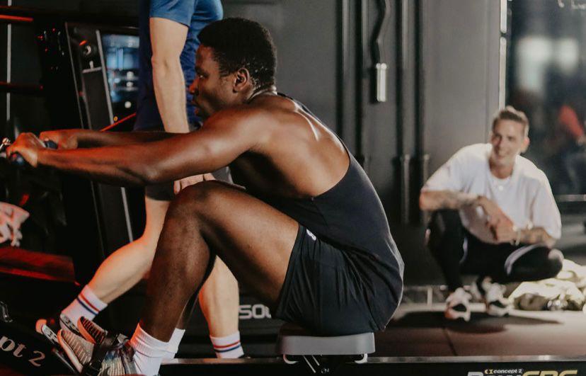 Men's group class on rowing machines