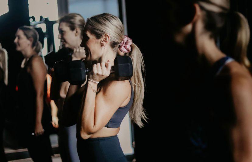 Women's group fitness class at The Fitness Cartel